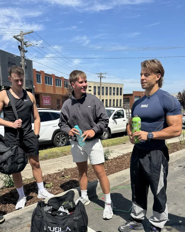 A coach with clients after a training session